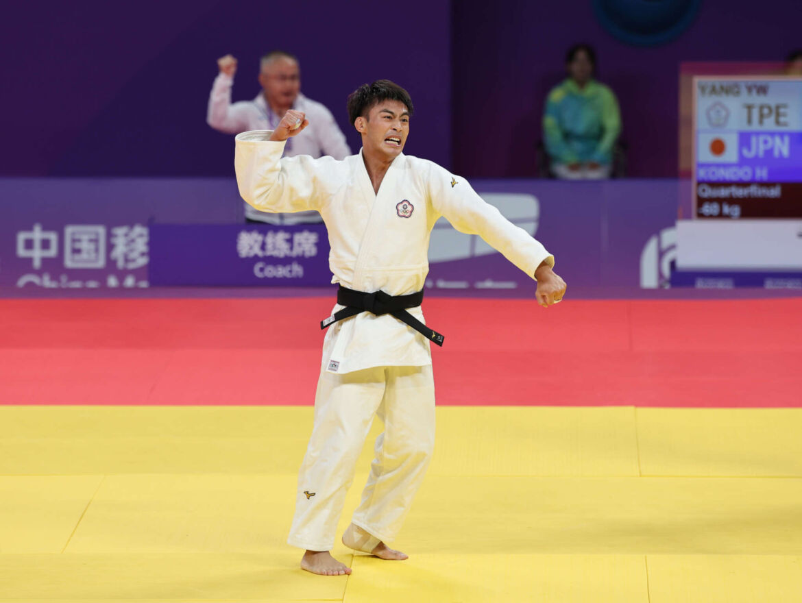 20230924楊勇緯獲得勝利後振臂歡呼-照片來自中華奧會.jpg